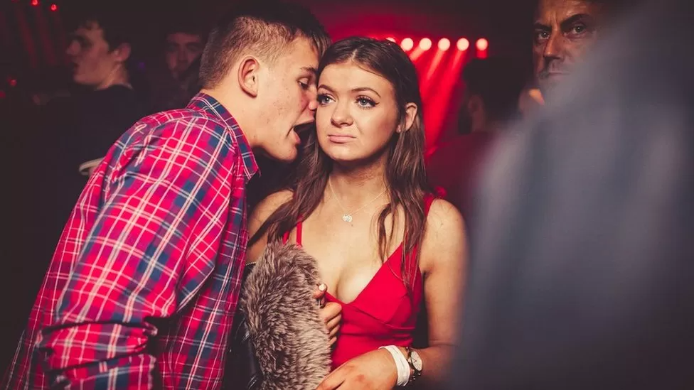 Man talking to woman in club Blank Meme Template