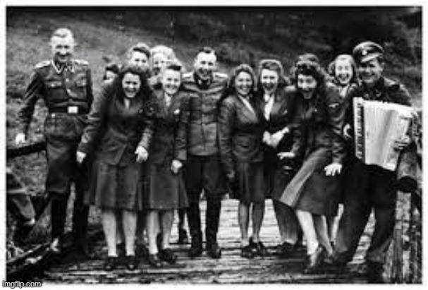 Images with Disturbing Backstories #13| Just a Fun Day? | image tagged in these are workers at,the auschwitz concentration camp,on their way to work | made w/ Imgflip meme maker
