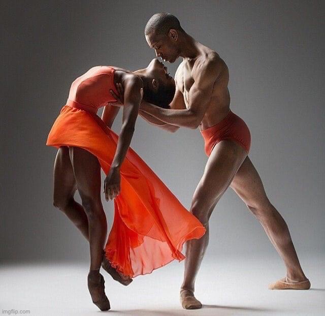 Dancers in orange | image tagged in dancers in orange | made w/ Imgflip meme maker