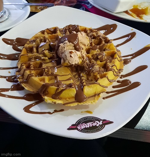 A tasty Reeses Waffle from Kaspas | image tagged in food,waffles,photos,you're actually reading the tags,stop reading the tags | made w/ Imgflip meme maker