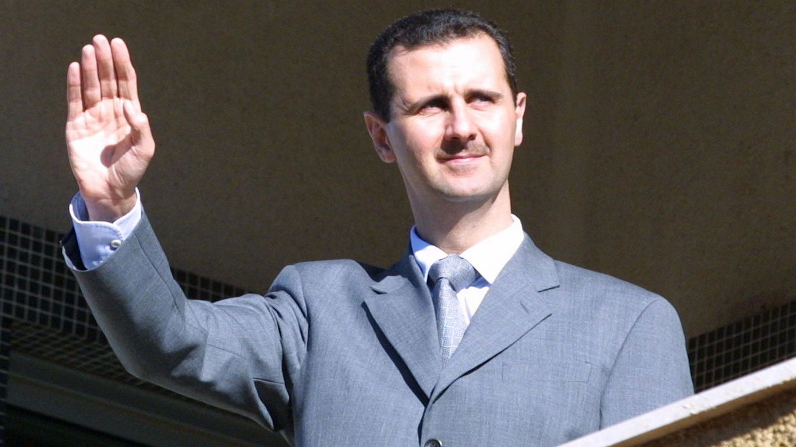 Bashar al-Assad Waving Blank Meme Template