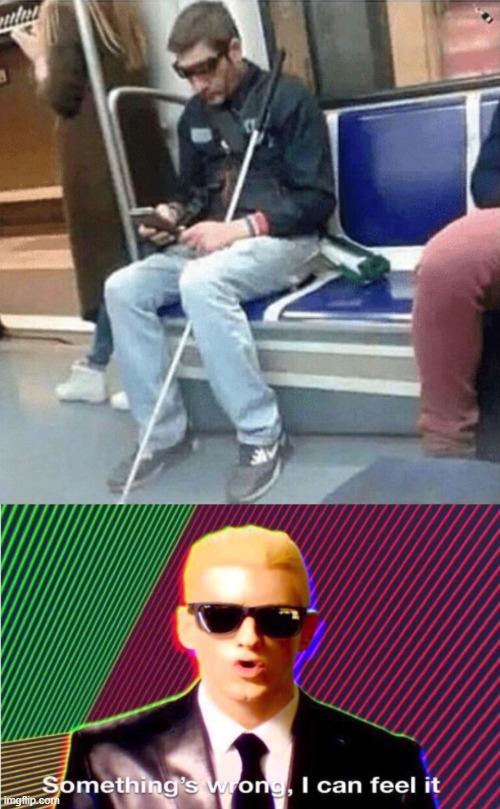 a blind man using a phone | image tagged in something s wrong | made w/ Imgflip meme maker
