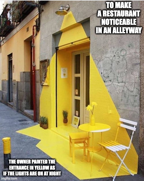 Painted Restaurant Enterance in Spain | TO MAKE A RESTAURANT NOTICEABLE IN AN ALLEYWAY; THE OWNER PAINTED THE ENTRANCE IN YELLOW AS IF THE LIGHTS ARE ON AT NIGHT | image tagged in restaurant,memes | made w/ Imgflip meme maker