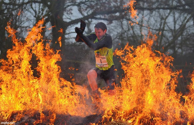 guy running through fire/doing something difficult | image tagged in guy running through fire/doing something difficult | made w/ Imgflip meme maker