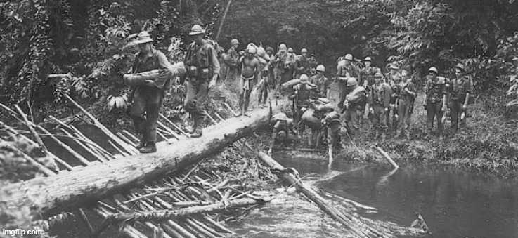 a photo of Australian soldiers during the Kokoda Track Campaign, this battle was fought in New Guinea against the Japanese. | image tagged in ww2,australia,kokoda | made w/ Imgflip meme maker