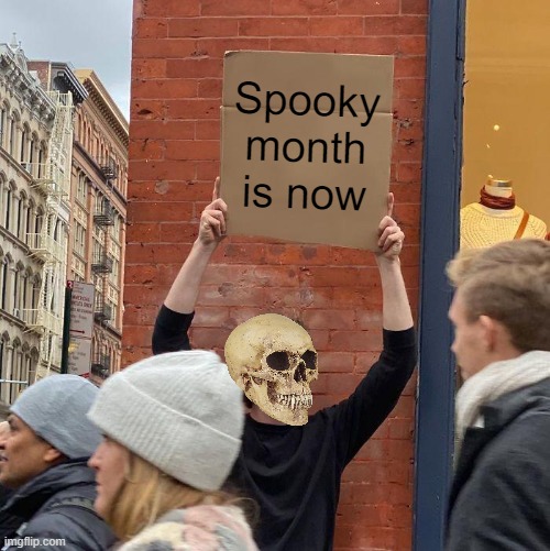 Spooky month is now | image tagged in memes,guy holding cardboard sign | made w/ Imgflip meme maker