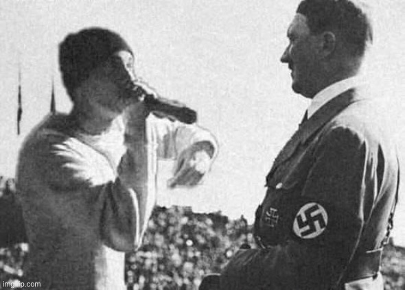 Eminem roasting hitler | image tagged in eminem roasting hitler | made w/ Imgflip meme maker