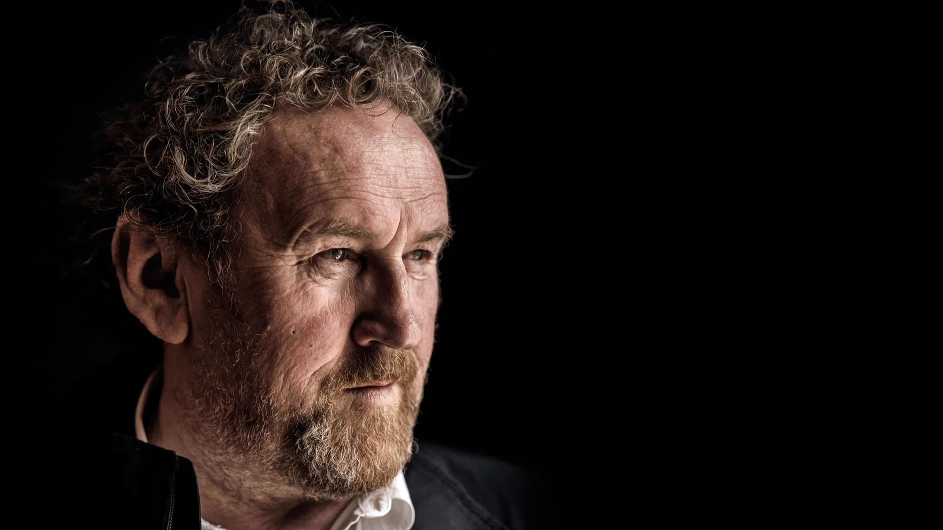 Colm Meaney (Miles O'Brien) looking pensive black background Blank Meme Template