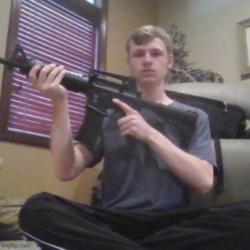 image tagged in man holding gun | made w/ Imgflip meme maker