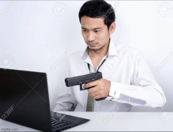 Asian dude pointing a gun at a computer | image tagged in asian dude pointing a gun at a computer | made w/ Imgflip meme maker