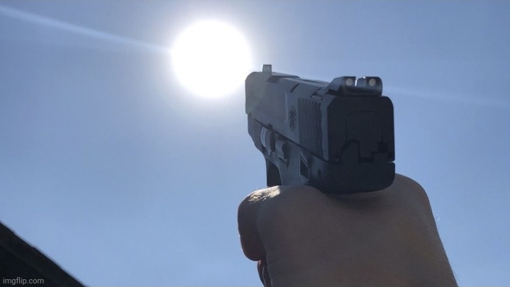Pointing gun at the sun | image tagged in pointing gun at the sun | made w/ Imgflip meme maker