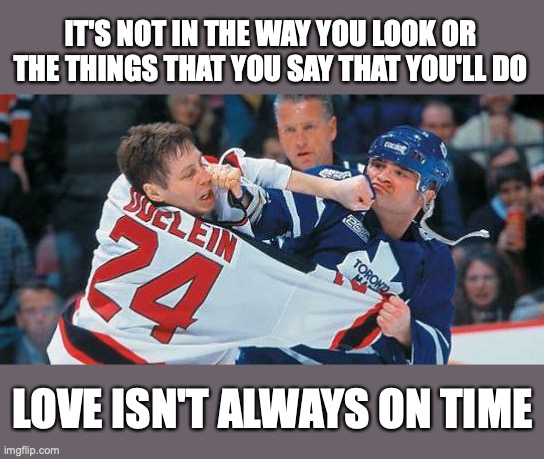 Toto | IT'S NOT IN THE WAY YOU LOOK OR THE THINGS THAT YOU SAY THAT YOU'LL DO; LOVE ISN'T ALWAYS ON TIME | image tagged in toto,hockey,music | made w/ Imgflip meme maker