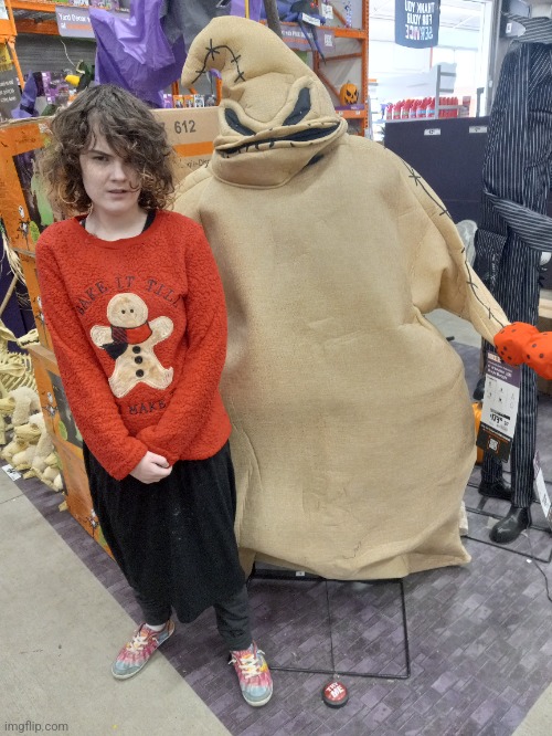 MY OLDEST DAUGHTER NEXT TO A LIFE SIZE OOGIE BOOGIE AT HOME DEPOT | image tagged in nightmare before christmas,halloween,spooktober | made w/ Imgflip meme maker