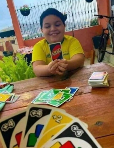 UNO kid with 1 card Blank Meme Template