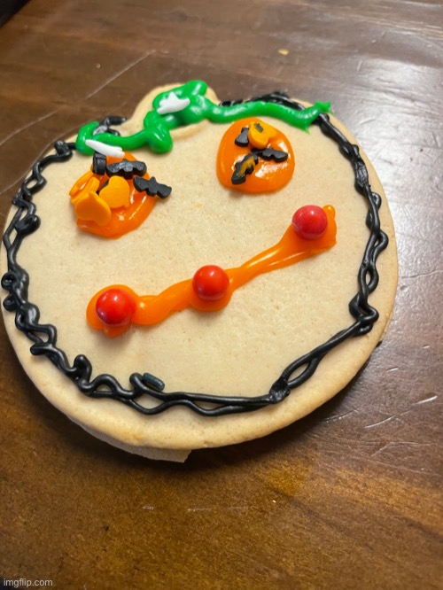 Funni man pumpkin cookie | made w/ Imgflip meme maker