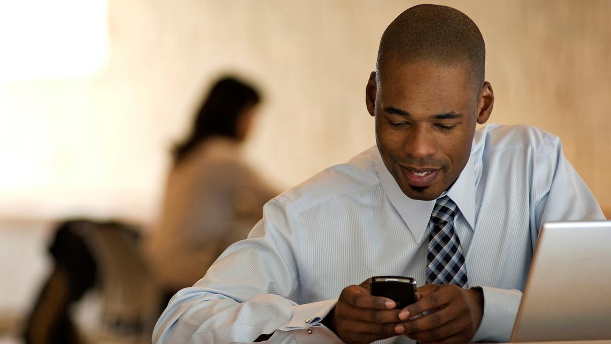 High Quality Black man on Smartphone 001 Blank Meme Template