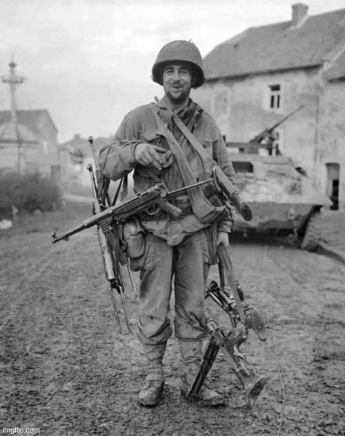 WW2 soldier with 4 guns | image tagged in ww2 soldier with 4 guns | made w/ Imgflip meme maker