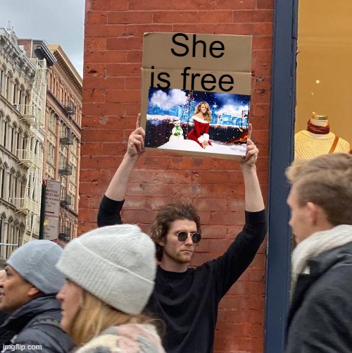 no | She is free | image tagged in memes,guy holding cardboard sign | made w/ Imgflip meme maker