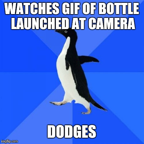 Socially Awkward Penguin | WATCHES GIF OF BOTTLE LAUNCHED AT CAMERA DODGES | image tagged in memes,socially awkward penguin | made w/ Imgflip meme maker
