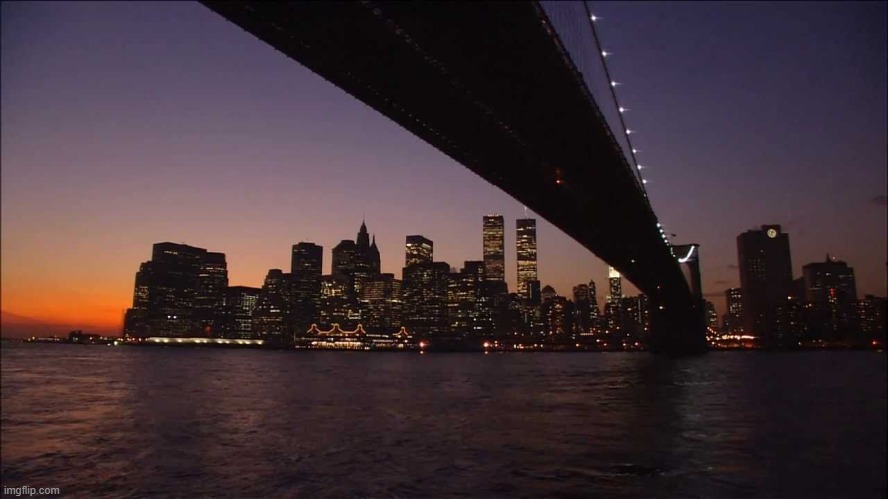 The sun sets over MSMG City on November 15, 2022 | made w/ Imgflip meme maker