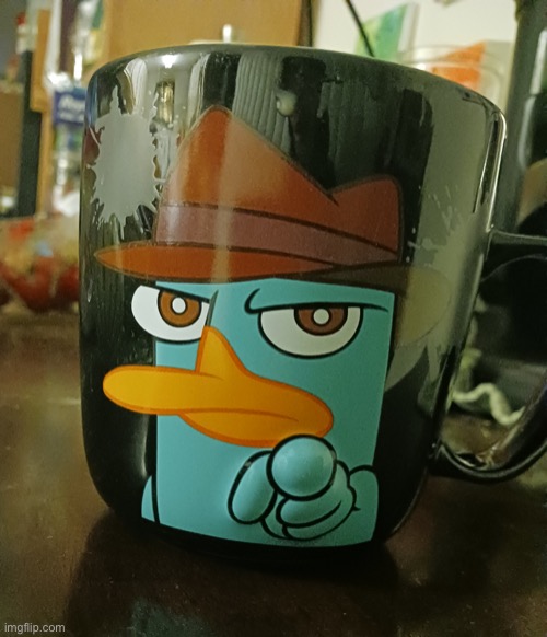 image tagged in perry the platypus mug | made w/ Imgflip meme maker