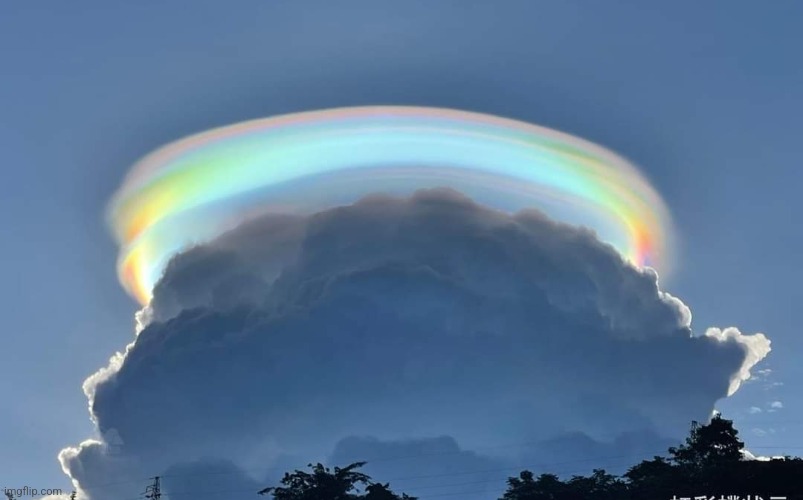 Iridescent Pileus Cloud over ChinaPhoto credit: Jiaqi Sun | image tagged in awesome,clouds,china,beautiful nature,photography | made w/ Imgflip meme maker