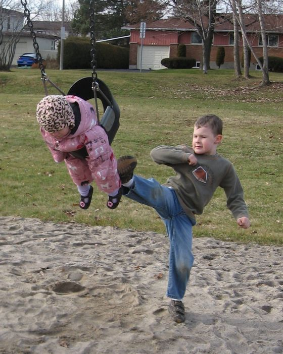 Boy kicking sibling on swing jack and jill Blank Meme Template