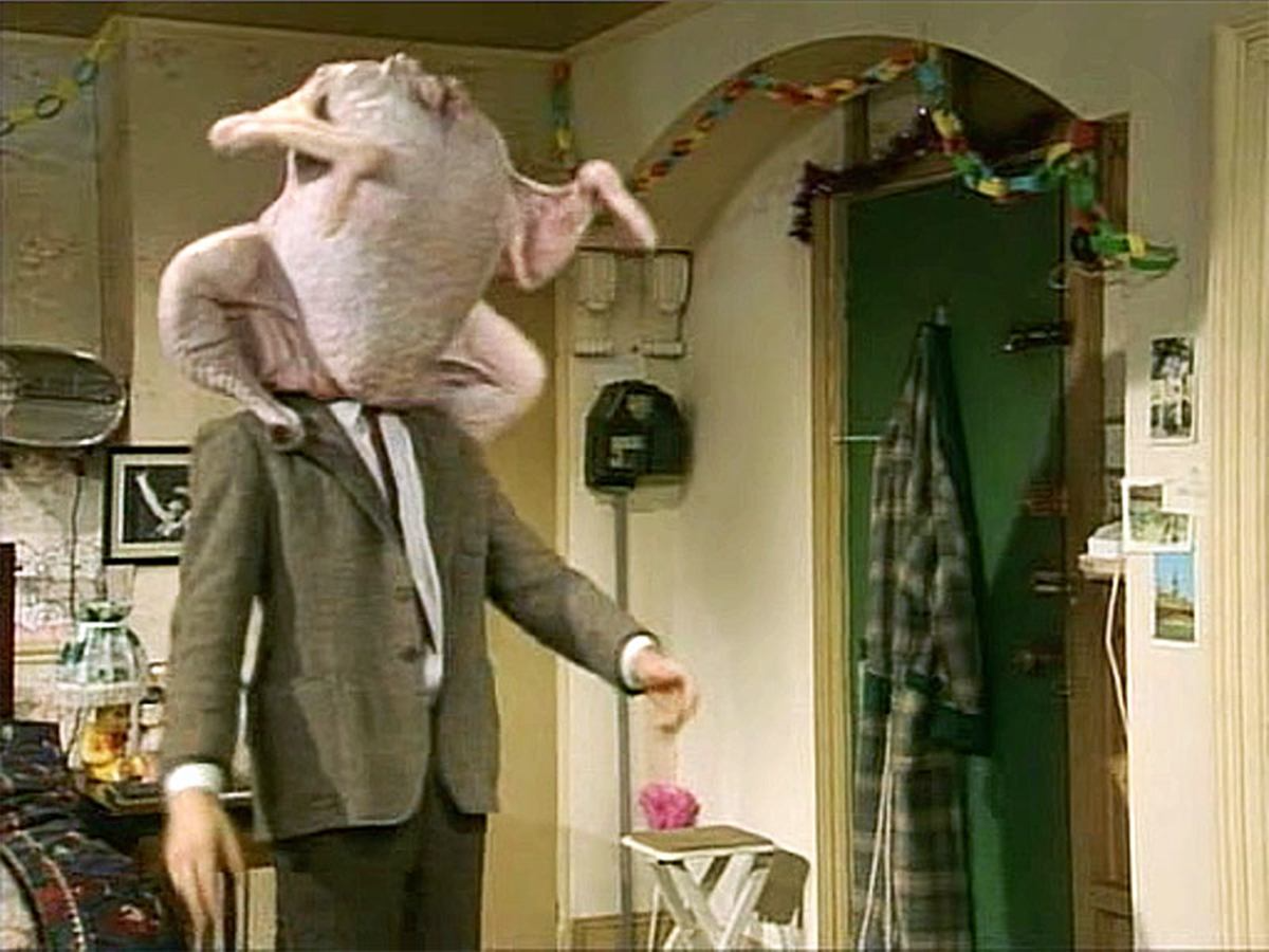 Mr. Bean stuck in a turkey Blank Meme Template