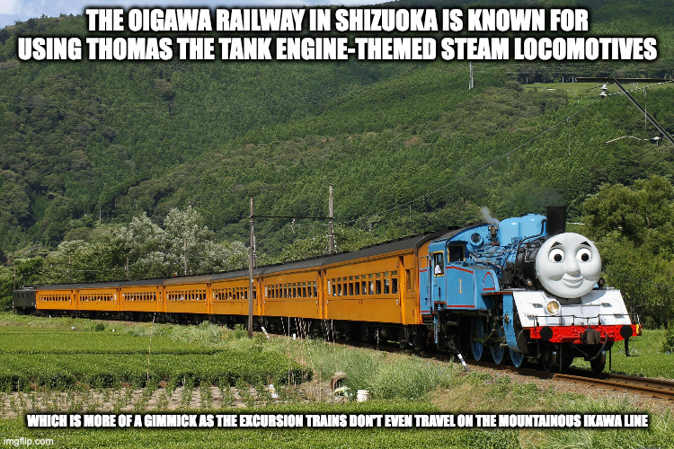 Thomas the Tank Engine-Themed Steam Locomotive | THE OIGAWA RAILWAY IN SHIZUOKA IS KNOWN FOR USING THOMAS THE TANK ENGINE-THEMED STEAM LOCOMOTIVES; WHICH IS MORE OF A GIMMICK AS THE EXCURSION TRAINS DON'T EVEN TRAVEL ON THE MOUNTAINOUS IKAWA LINE | image tagged in thomas the tank engine,train,memes | made w/ Imgflip meme maker