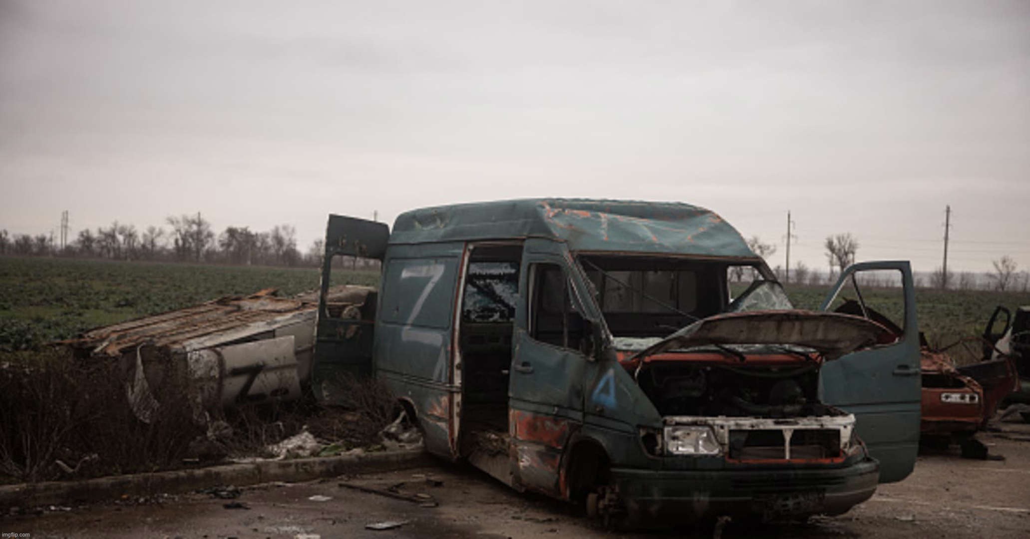 Russian van abandoned outside Kherson | image tagged in russian van abandoned outside kherson | made w/ Imgflip meme maker