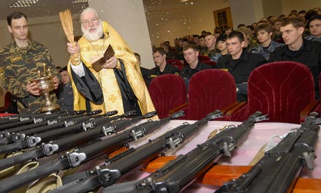 Russian Orthodox priest blesses rifles Blank Meme Template