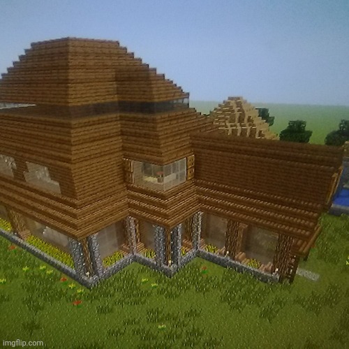 A house I built awhile back. What do you think? | image tagged in minecraft,gaming | made w/ Imgflip meme maker