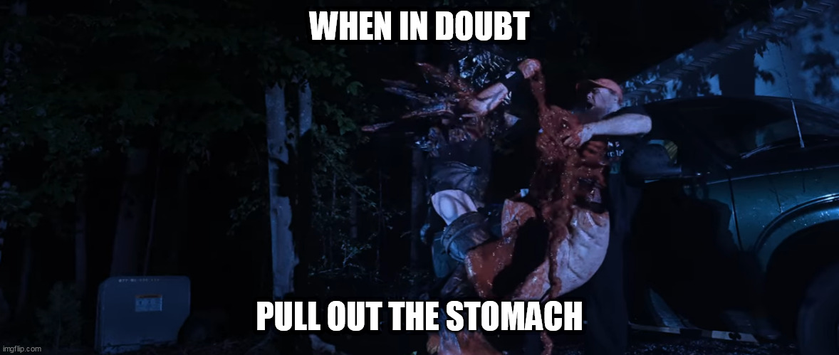 Stomach Pulling | WHEN IN DOUBT; PULL OUT THE STOMACH | image tagged in gwar,violence,blood,gore,disembowelment,stomach | made w/ Imgflip meme maker