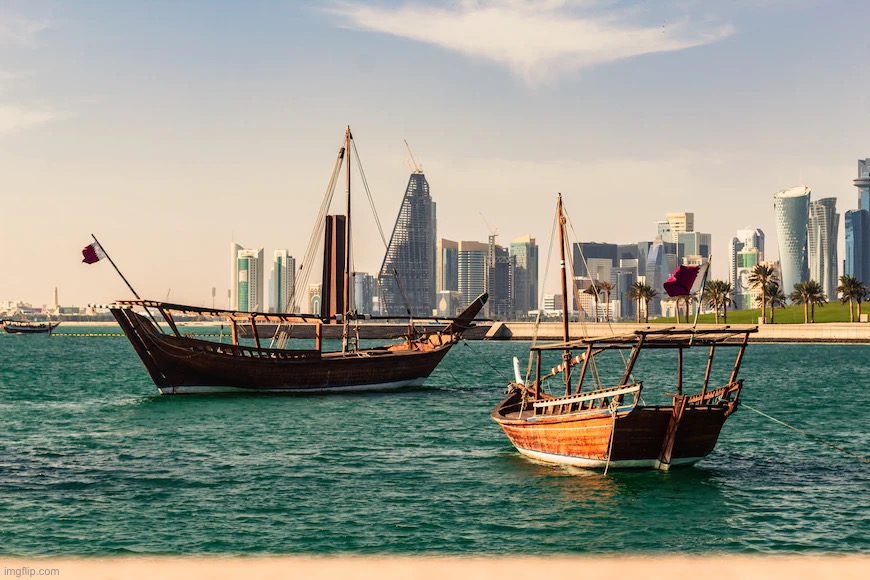 Corniche, Doha, Qatar | image tagged in qatar,city,boats | made w/ Imgflip meme maker