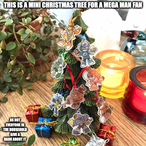 Mini Mega Man Chirstmas Tree | THIS IS A MINI CHRISTMAS TREE FOR A MEGA MAN FAN; AS NOT EVERYONE IN THE HOUSEHOLD GIVE A DARN ABOUT IT | image tagged in christmas tree,megaman,memes | made w/ Imgflip meme maker