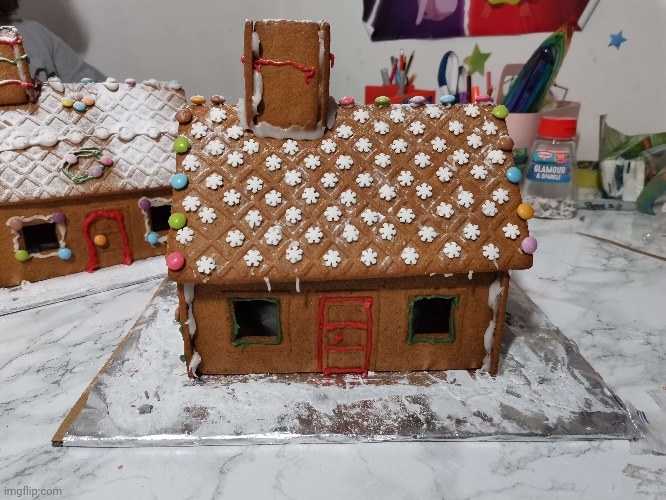 The gingerbread houses me and my sister made a few days ago | image tagged in gingerbread,art,christmas,fun | made w/ Imgflip meme maker