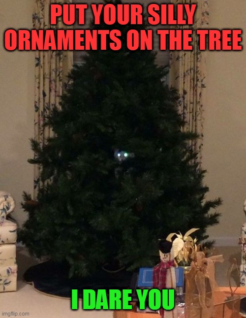 KITTY IS READY TO KNOCK THEM OFF | PUT YOUR SILLY ORNAMENTS ON THE TREE; I DARE YOU | image tagged in cats,funny cats,christmas tree | made w/ Imgflip meme maker
