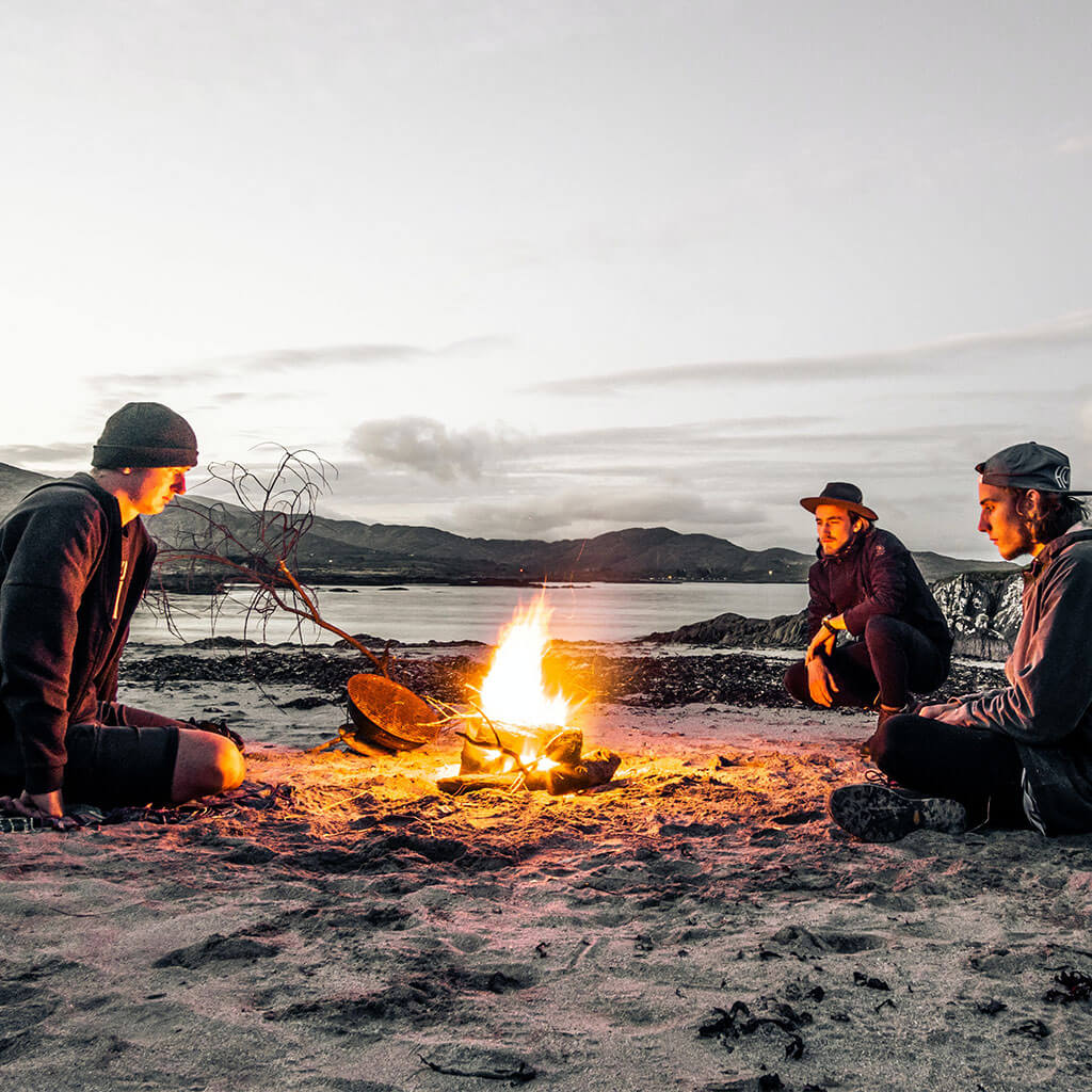 Three guys around fire Blank Meme Template