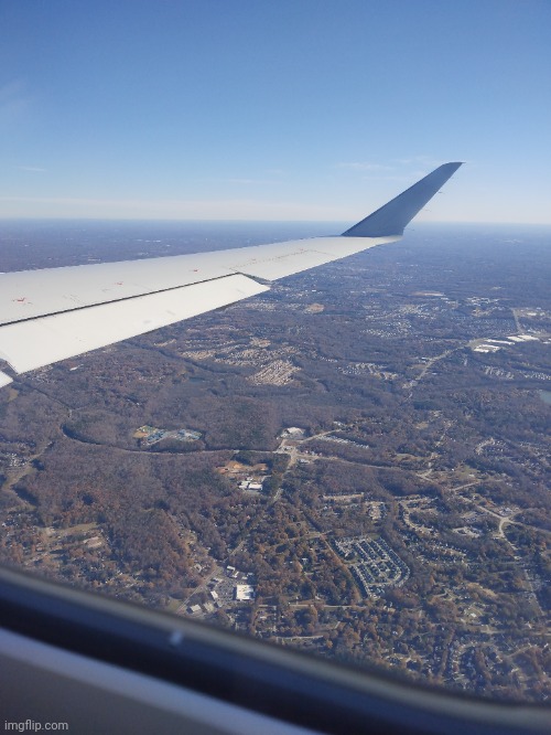 A view over Southern North Carolina from the back seat of a CRJ 900, taken in Dec. 1st this year | made w/ Imgflip meme maker