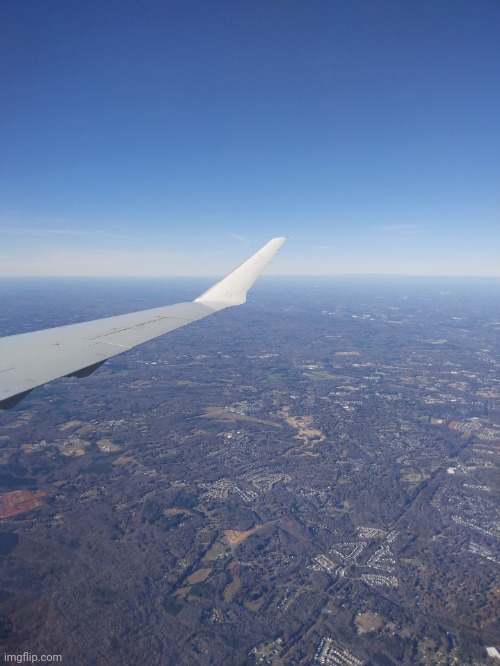 Another view of North Carolina from the very back seat of a CRJ 900, taken in Dec. 1st this year | made w/ Imgflip meme maker