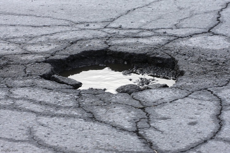 Pothole | image tagged in pothole | made w/ Imgflip meme maker