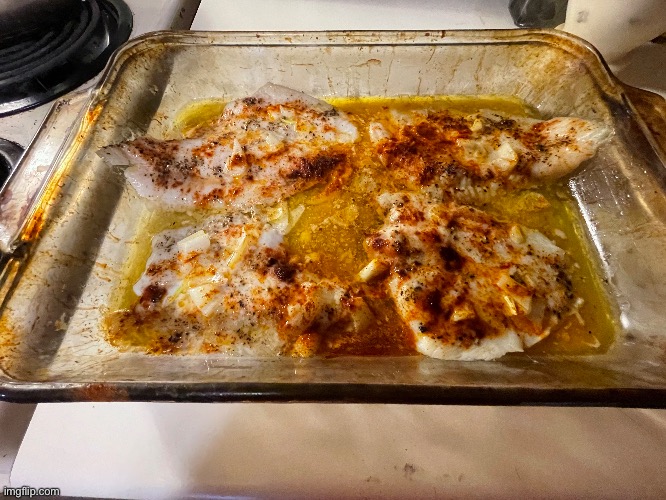 This is baked Flounder fish with lemon butter. I put Paprika, Black Pepper, and Salt | image tagged in cooking | made w/ Imgflip meme maker