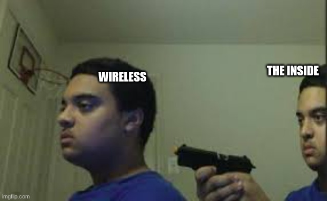 Guy with a gun | WIRELESS THE INSIDE | image tagged in guy with a gun | made w/ Imgflip meme maker