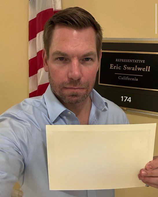 High Quality Eric Swalwell holding a sign Blank Meme Template
