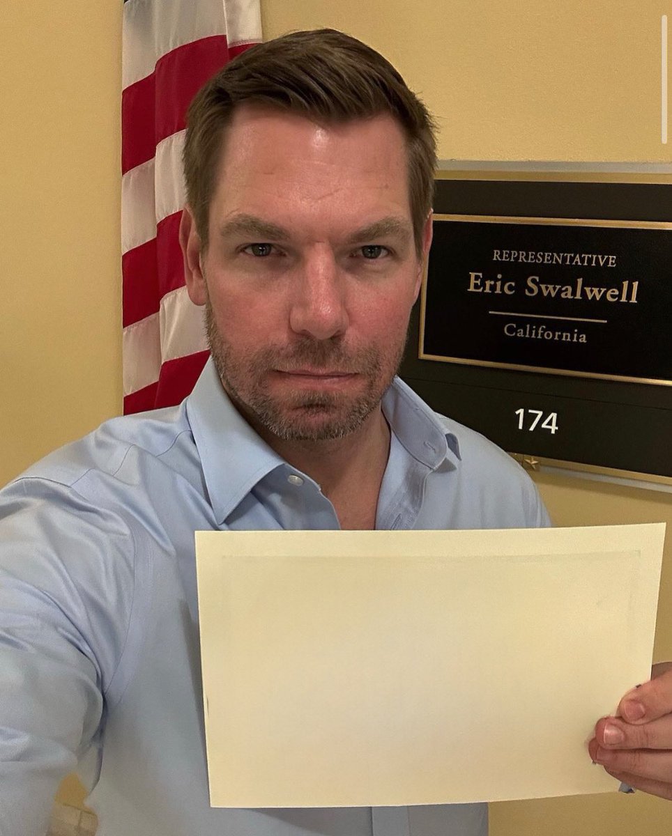 Eric swalwell holding up a sign Blank Meme Template