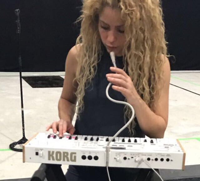 Shakira playing synth Blank Meme Template