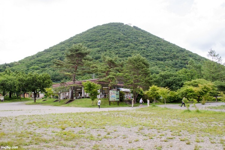 this is Mt. Haruna in Japan, it is famous for being the inspiration of Mt. Akina from Initial D | image tagged in initial d | made w/ Imgflip meme maker
