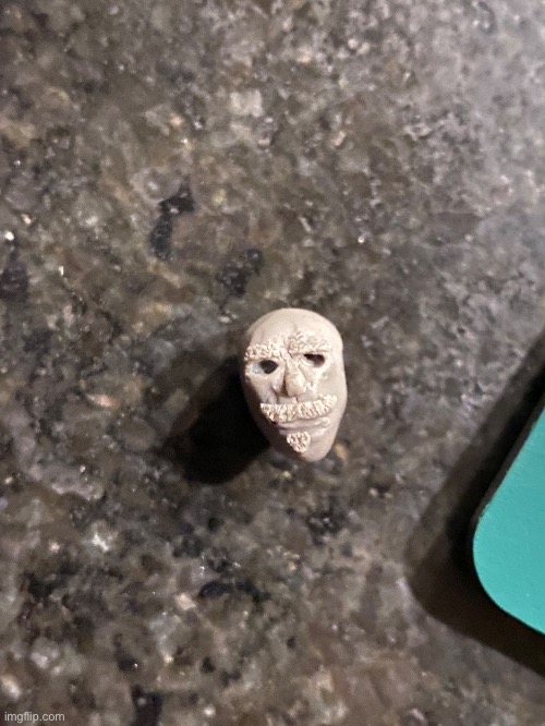 I was sculpting a person out of clay. I accidentally dropped it, which messed it up. I took this picture before that happened | image tagged in clay,art,soulless stare | made w/ Imgflip meme maker