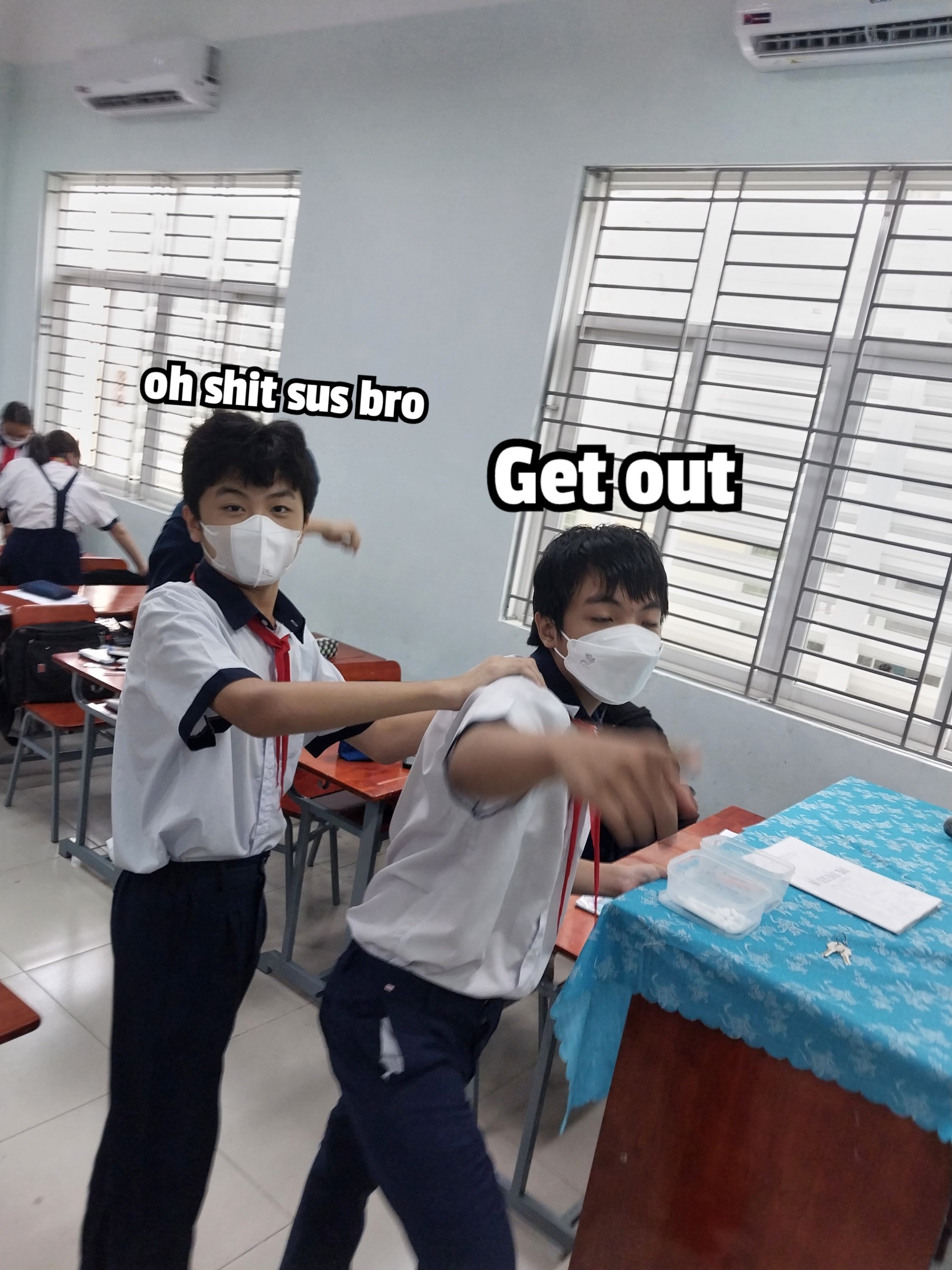 SUS student being held onto by another student Blank Meme Template