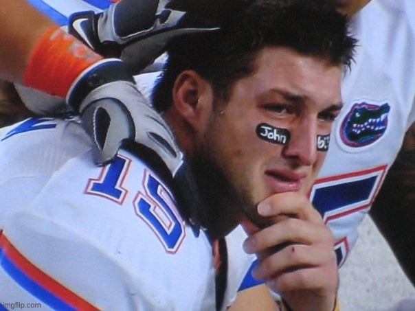 Crying football player | image tagged in crying football player | made w/ Imgflip meme maker